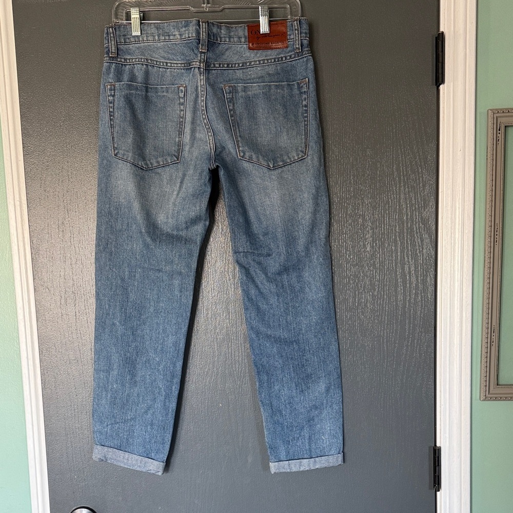 Free People Distressed Blue Jeans with cuffed ankles. Low waist medium rise - Picture 3 of 4